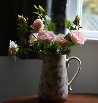 Vintage-style pitcher vase with roses