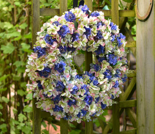 Two-toned faux hydrangea and cornflower wreath