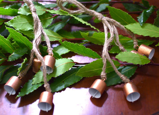 Set of four  small bronze bells