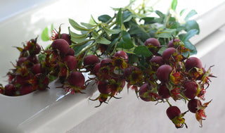 Faux rosehip spray in red color