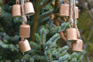 Set of four  small bronze bells