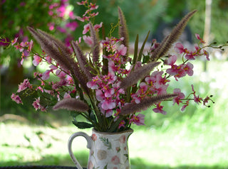 Pink orchids arrangement in Vintage-Style jug