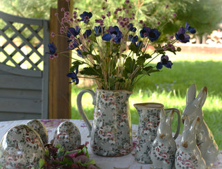 Vintage jugs in grey colour
