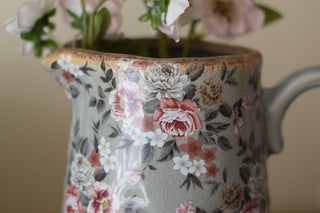Vintage jugs in grey colour
