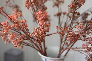 Artificial berry stem in orange color