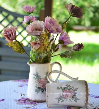 Vintage pitcher vase featuring old botanical-style rose prints