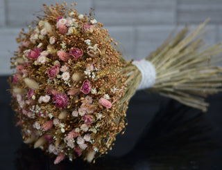 Dried flower bouquet with pink roses